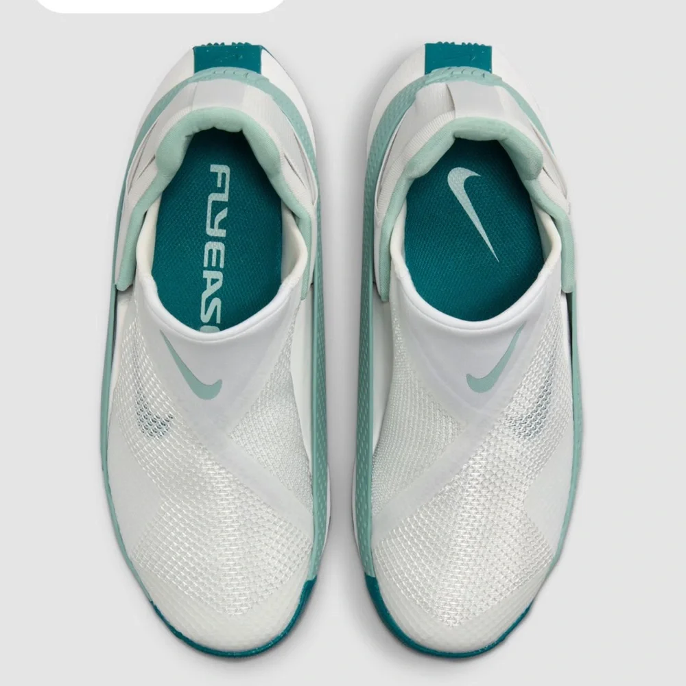 Nike Women’s Slip-On Sneakers in White and Teal